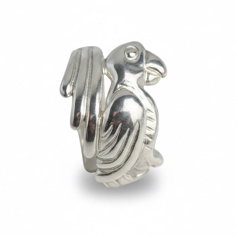 Silver Parrot-shaped object on a white background
