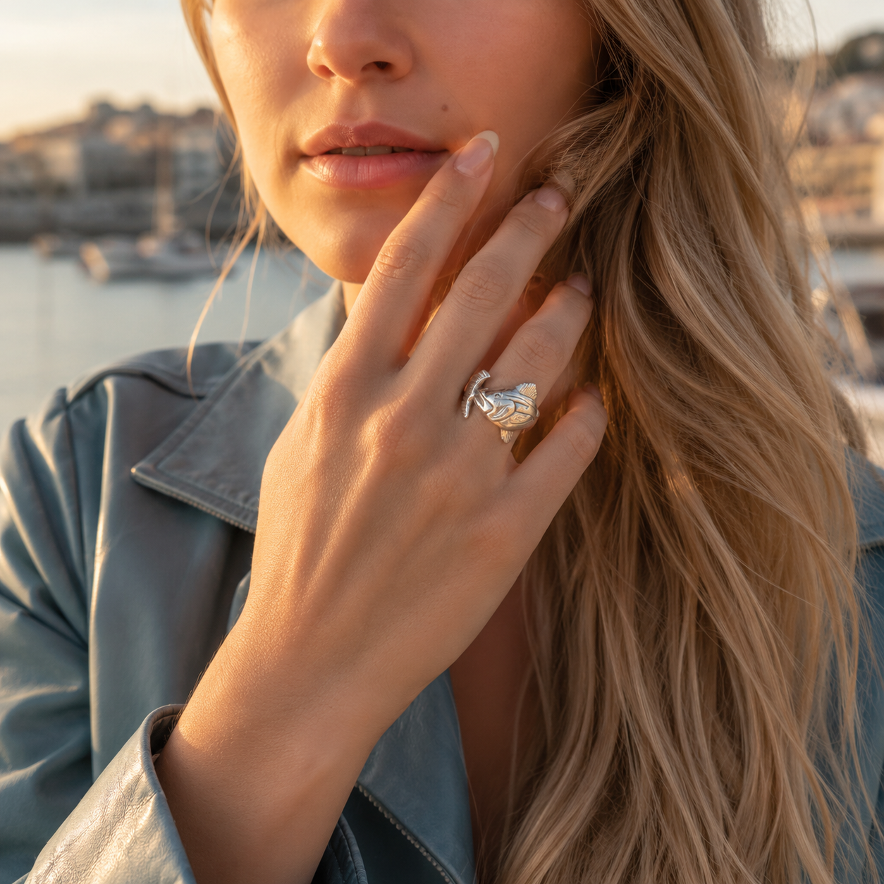 Close-up of a woman wearing a striper ring with a scenic background