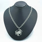 Silver crab necklace  on a black bust with a white background