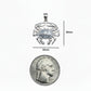 Silver crab pendant with measurements and a comparison to a quarter coin on a white background