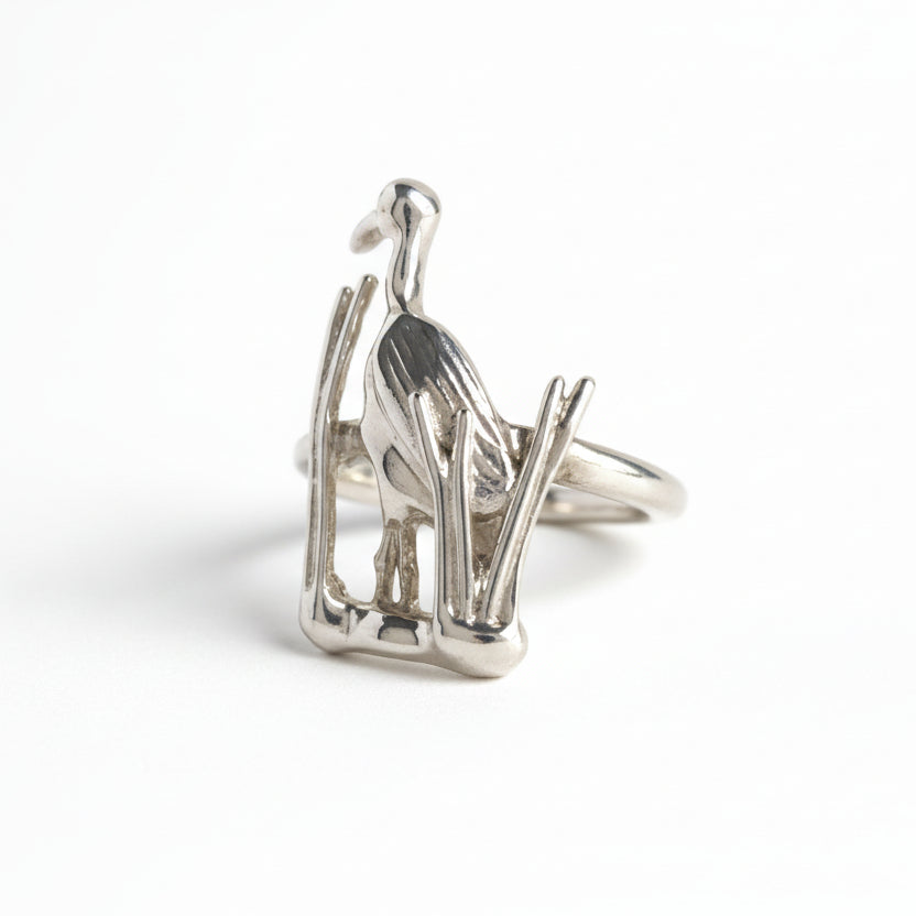 Blue heron Silver ring on a light gray background