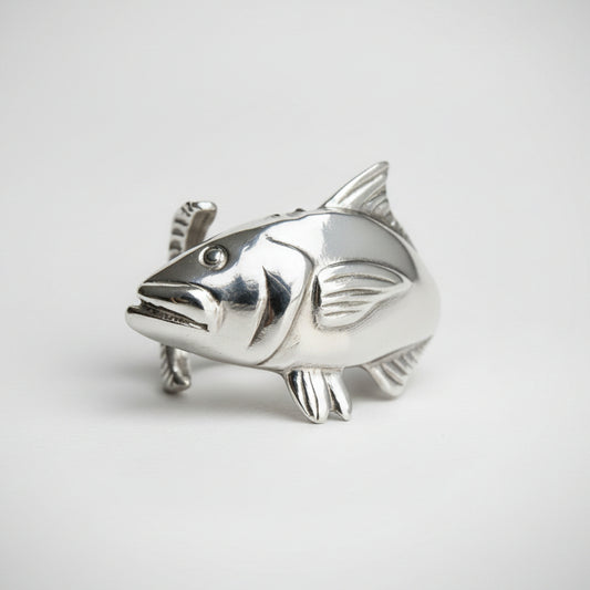 Cobia fish-shaped silver ring on a white background