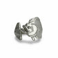silver flounder ring on a light gray background
