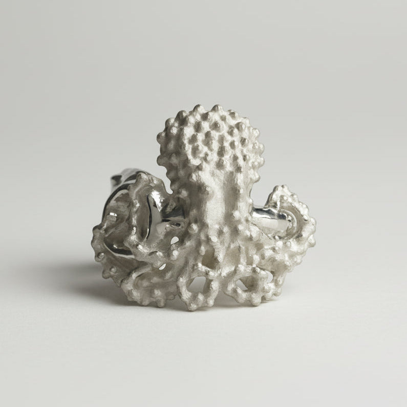 Octopus coming our of Jar Silver Ring on light gray background