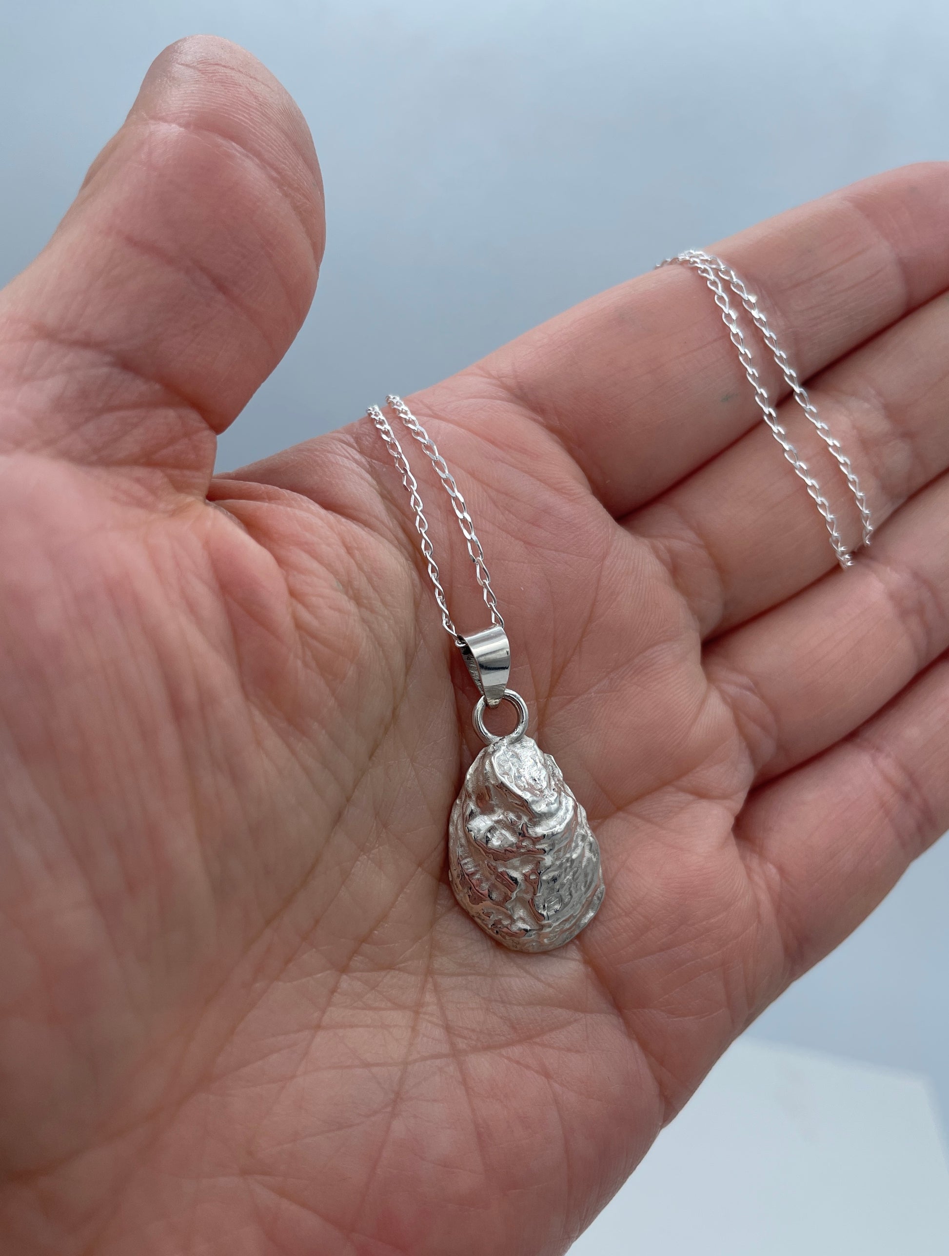 Oyster Charm Front on arm
