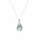 Silver necklace with a oyster-shaped pendant on a light gray background