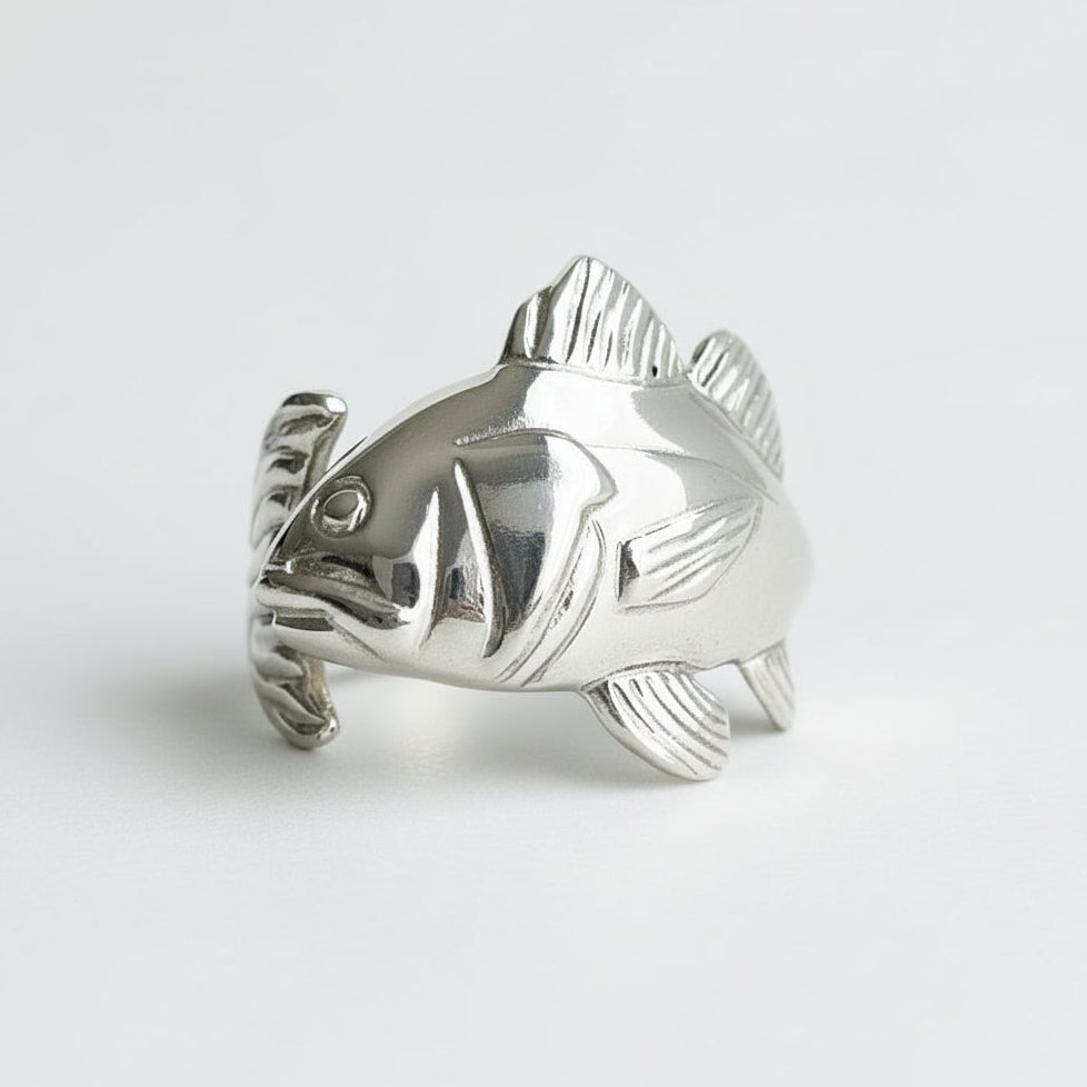 Silver Red Drum ring on a light gray background