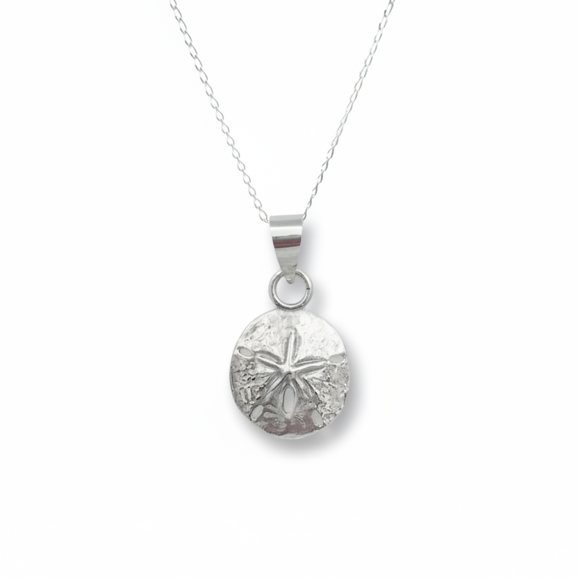 Silver sand dollar pendant necklace on a white background