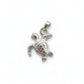 A small silver sea turtle pendant charm with a textured shell and a loop at the top, shown on a plain light gray surface.