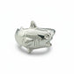 Silver shark-shaped object on a white background