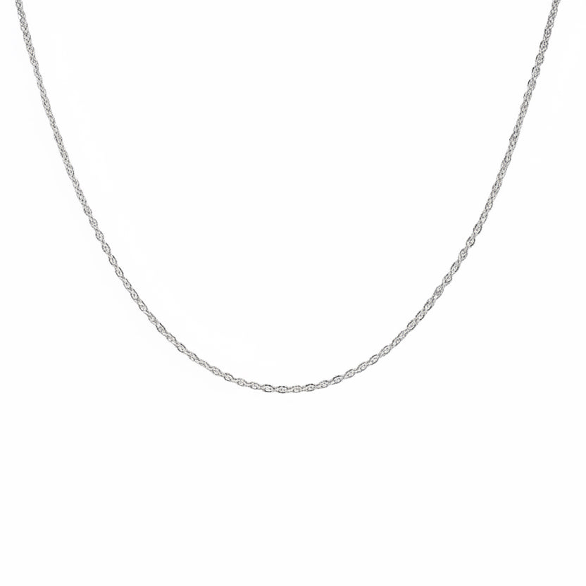 Silver chain necklace on a light gray background