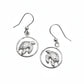 Pair of silver turtle earrings on a light gray background